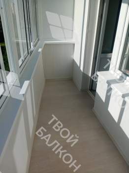 Остекление балкона и отделка стен